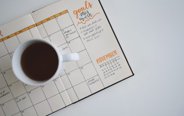 Coffee mug on calendar